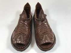 "DESCRIPTION:HUARACHES PIHUAMO PREMIUM VINTAGE \"ACME'' STYLE MEXICAN SANDALS CONVERTION CHART MEN USA - MEX SIZE:SIZE AVALAIBLE: VARIOUS SIZES   (see our available sizes in above of our main ad)  CHART MEN USA - MEX SIZES:USA 5 -5.5 (MEX 23),USA 6 -6.5 (MEX 24),USA 7 -7.5 (MEX 25), USA 8 - 8.5 (MEX 26), USA 9 - 9.5 (MEX 27), USA 10 - 10.5 (MEX 28), USA 11 - 11.5 (MEX 29), USA 12 - 12.5 (MEX 30), USA 13 -3.5 (MEX 31).    IMPORTANT: If you wear half size shoes, we recommend going down a half size Traditional Hand Tooled Brown Huarache Sandals, Traditional Leather Huarache Sandals For Festivals, Traditional Leather Open Toe Huaraches, Artisan Leather Huaraches For Festivals, Adjustable Leather Traditional Huaraches, Traditional Hand Tooled Huaraches With Round Toe, Traditional Hand-tooled Slip-on Huaraches, Traditional Closed Toe Huaraches With Leather Footbed, Festival Leather Huarache Sandals With Leather Sole