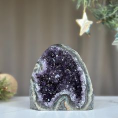 This is a unique Amethyst with unusual druzy cave formations on one side. The stone you will receive is the exact one as in the picture. ✧ MEASURES: Width: 4.5 in x Height: 4.5 in. Weight 1.7 lb (784 gr) Unique Amethyst Geodes As Gift, Unique Purple Geodes For Gifts, Unique Purple Geodes For Gift, Healing Amethyst Geodes, Amethyst Geodes Gemstone Gift, Amethyst Raw Stone Geodes As Gifts, Amethyst Geodes Raw Stone As Gift, Amethyst Geode Raw Stone Gift, Purple Large Stone Geode As Gift