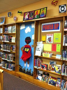 a library filled with lots of books and posters