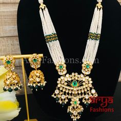 Shaira Long Pacchi Kundan Emerald Statement Necklace/ Rajwadi Ruby Necklace Made in Brass with 22 karat gold plating, Pacchi kundan and semi precious beads Handcrafted To PerfectionLight Weight Choker NecklacePerfect For Indian Weddings And CelebrationsA Beautiful & Memorable Gift for Weddings or engagement.Necklace: 10-12 InchesEarrings: 2.5 InchesEarrings come with push back closure Traditional Ruby Kundan Necklace For Celebration, Traditional Heavy Kundan Necklace With Ruby, Luxury Ruby Kundan Necklace For Festivals, Traditional Ruby Meenakari Kundan Necklace, Festival Kundan Necklace With Ruby, Emerald Statement Necklace, Engagement Necklace, Precious Beads, Ruby Necklace