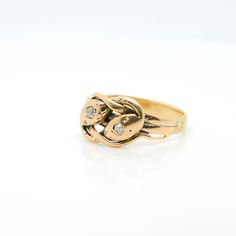 A fine antique gold & diamond figural snake ring. In 14K gold. In the shape of 2 intertwined snakes. Each pave set with a round single cut diamond to their heads and traces of an etched design. Simply a wonderful late Victorian ring! Date: Early 20th Century Overall Condition: It is in overall fair, as-pictured, used estate condition. Condition Details: One diamond is either slightly out of round or has a small flake to its girdle. The etched design is over-polished and the surface in general is Gold Snake Ring With Single Cut Diamonds, Formal Yellow Gold Snake Ring With Single Cut Diamonds, Elegant Yellow Gold Snake Diamond Ring, Formal Yellow Gold Snake Ring With Diamond Accents, Gold Snake-shaped Diamond Ring For Anniversary, Yellow Gold Snake Ring With Diamond Accents For Anniversary, Antique Gold Snake Ring For Formal Occasions, Heirloom Style Snake Ring For Anniversary, Heirloom Snake Ring For Anniversary