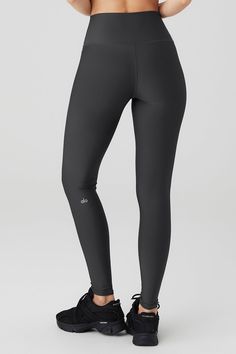 Just as perfect for out and about as they are for a good sweat session. These leggings are made from Airlift—our most compressive, supportive fabric with a sheeny finish and four-way-stretch for a glove-like fit. The high-rise waistband is double-layered for a sleek look, and the full-length legs are designed to hit at the ankle. Choose your favorite color(s) and get ready to wear yours on repeat. Sleek Supportive Bottoms For Training, Sleek Compression Sports Bottoms, Sleek Compression Sport Bottoms, Sporty Alo Yoga Leggings For Sports, Alo Yoga Sporty Yoga Pants For Pilates, Alo Yoga Sporty Leggings For Sports, Sporty Compressive Activewear By Alo Yoga, Alo Yoga Compressive Athleisure Leggings, Sporty Alo Yoga Leggings For Yoga