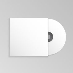 two blank white cds on a gray background