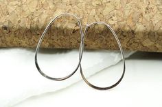 Silver Hoop Earrings Oval Hoops Hammered Hoops Sterling | Etsy Modern Oval Teardrop Earrings For Pierced Ears, Modern Hypoallergenic Oval Jewelry, Modern Oval Hoop Earrings With Ear Wire, Modern Oval Sterling Silver Hoop Earrings, Minimalist Oval Metal Hoop Earrings, Oval Metal Hoop Earrings, Oval Nickel-free Hoop Earrings For Everyday Wear, Nickel-free Oval Hoop Earrings For Everyday, Everyday Oval Nickel-free Hoop Earrings