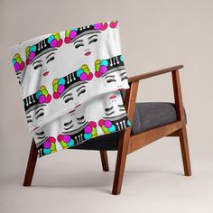 a chair with a colorful blanket on it