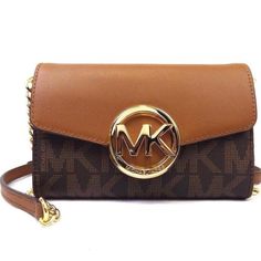 Mini Crossbody In Brown Leather With Mk Monogram And Gold Hardware. Plenty Of Compartments Including One With Zipper Compartment. Magnetic Snap Closure. Measures 4.5”X 7” Brand New With Tags. Received As A Gift And Never Used. Mk Monogram, Lg Phone, Bags Michael Kors, Mini Crossbody Bag, Mini Crossbody, Bago, Michael Kors Bag, Tan Brown, Brown Gold