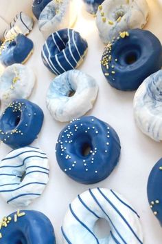 blue and white donuts with gold sprinkles