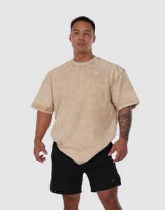 Stand out with our sleek oversized t-shirts, crafted from durable, 100% pre-shrunk cotton. Its acid-washed finish adds a vintage flair, while the roomy fit offers ultimate comfort and freedom of movement. A perfect fusion of style and functionality, this muscle shirt is a must-have for those who value both aesthetics and practicality. Model: Kyle's chest is 48.5 inches, and his height is 5'9 he wears 2XL. Why our customers love these men's shirts? Acid-washed fabric The dyeing and washing process gives each piece its own unique color finish, which means your item may have slight variations in its shade. Oversized & baggy fit Ideal for gym, lounging and everyday wear 100% premium cotton (won't show sweat. Dries fast) Comes with our sustainable 100% compostable packaging Whether you're hitti