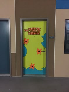 the door is decorated with an image of a monster