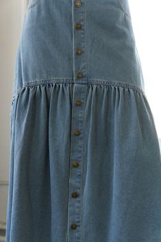 A washed denim midi skirt featuring button down, side pocket, frayed hem and back pockets Details: Self : 90% Cotton 10% Polyester Size & Fit - Model is 5`9" And Wearing Size Small- Measurements Taken From Size Small- Approx. Length: 38" Denim Blue Skirt With Button Closure, Button-up Denim Skirt With Pockets, Medium Wash Midi Skirt With Pockets, Cotton Midi Denim Skirt With Pockets, Washed Blue Denim Skirt With Frayed Hem, Spring Denim Skirt With Button Closure Medium Wash, Spring Medium Wash Denim Skirt With Button Closure, Casual Midi Denim Skirt With Pockets, Denim Blue Midi Length Denim Skirt