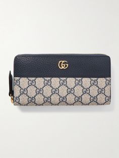 Gucci's sleek and streamlined wallet is part of the Italian house's signature 'Marmont' collection. Made from 'GG Supreme' coated-canvas in a '70s palette, it's detailed with textured-leather and the iconic logo plaque. Slip it into a coordinating tote. 70s Palette, Canvas Wallet, Gucci Gg Marmont, Raffia Bag, Iconic Logo, Print Coat, Gg Marmont, Fine Watches, Gucci Accessories