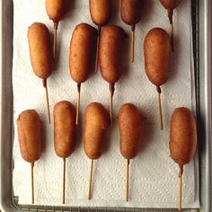 there are many small food items on the stick together in order to make them look like they're ready to be eaten