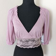 Urban Outfitters Lavender Samara Crop Top. Size Small. New With Tags. Fitted Purple Top With Lace Trim, Feminine Lavender V-neck Top, Feminine Purple Tops With Lace Trim, Purple Stretch Feminine Top, Feminine Fitted Lavender Top, Stretch Purple Feminine Tops, Feminine Fitted Purple Tops, Elegant Mauve Tops For Spring, Lavender Summer Top For Daywear