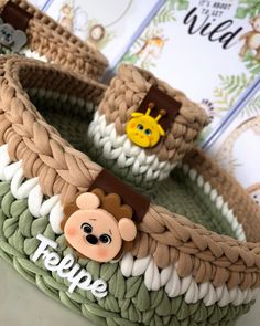 a close up of a woven basket with a monkey on the front and an animal on the back