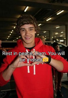 a young man in a red hoodie with his arms crossed and the words rest in peace, i am you will be missed