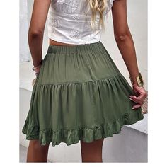 Green Buttoned Mid-waist A-line Mini Skirt Spring Solid Color Flared Mini Skirt, Spring Flared Mini Skirt In Solid Color, Flared Mini Skirt In Solid Color For Spring, Casual A-line Skirt With Elastic Waistband, Solid Color Tiered Lined Skort, Flowy Solid Color Mini Skirt, Lined Tiered Skort, Solid Color Tiered Skort With Lined Skirt, Tiered Lined Skort