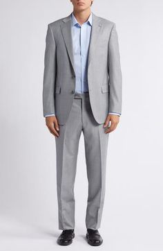 Softly heathered grey wool brings all-occasion versatility to a suit styled with traditional detailing, from the notched lapels to the flat-front trousers. Jacket has notched lapels; four-button cuffs; chest welt pocket; flap pockets; side vents Trousers have zip fly; front slant pockets; back button-welt pockets Jacket is lined; trousers are lined to the knee Unhemmed 99% wool, 1% other fibers Dry clean Made in Italy Suit Style, Pocket Jacket, Peter Millar, Wool Suit, Welt Pockets, Flap Pocket, Welt Pocket, Mens Suits, The Knee