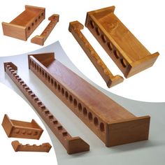 several pieces of wood with holes in the middle and one piece cut out to show them