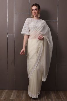 Off-white chinon saree with floral, thread and sequins hand embroidery. Comes with a padded blouse. - Aza Fashions White Pre-draped Saree For Designer Wear, White Dola Silk Pre-draped Saree For Wedding, Elegant White Pre-draped Saree For Eid, White Pre-draped Saree With Resham Embroidery For Wedding, Festive White Pre-draped Saree With Cutdana, White Chanderi Pre-draped Saree With Zari Work, White Pre-draped Saree With Zari Work For Eid, Elegant White Tissue Silk Pre-draped Saree, White Silk Pre-draped Saree With Zari Work