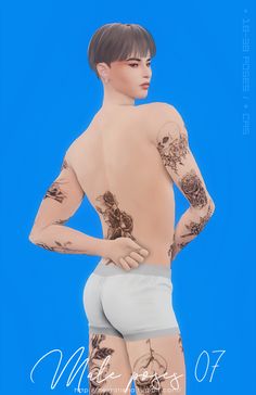 a man with tattoos on his back and arms