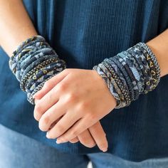 Indulge in a touch of luxury with the Aid Through Trade Roll-On® Midnight Blue Bracelet. This handcrafted accessory adds instant elegance to any outfit. Made by women artisans, each purchase helps to empower and uplift communities. Elevate your style and make a positive impact with this stunning bracelet. Elegant Blue Wrap Bracelet As A Gift, Elegant Blue Wrap Bracelet As Gift, Bohemian Blue Cuff Bracelet For Party, Trendy Adjustable Blue Cuff Bracelet, Blue Hand Wrapped Bracelets, Elegant Handmade Blue Wrap Bracelet, Handmade Blue Braided Bracelets, Trendy Handmade Blue Wrap Bracelet, Handcrafted Accessories