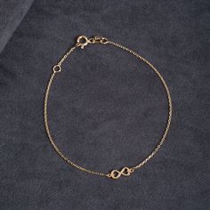 Tiny 14k 18k Solid Gold Infinity Bracelet, Dainty Heart Infinity Charm Gold Bracelet, Endless Love Bracelet Gift For Her, Gift For Mom ► Adding a customized tiny bar at clasp may be a good idea: https://etsy.me/3cn9OQ5 Material: Solid Gold, Real Gold (not gold filled or gold plated material) Available Gold Karat: 14K, 18K optional Available Gold Colors: Yellow, Rose, White Infinity width: 8.50 mm Infinity height: 4.00 mm You can customize your anklet length from 6 inches to 8.50 inches Petite: 6.0 inches Adult (X Small): 6.5 inches Adult (Small): 7.0 inches Adult (Medium): 7.5 inches Adult (Large): 8.0 inches Adult (X Large): 8.5 inches We put an additional adjustment ring on the necklace to use it shorter.   M o r e  *  F r o m  *  U s   Goldstore Jewelry - https://etsy.me/3gHtcrZ * Edito Yellow Gold Infinity Bracelets For Everyday, Yellow Gold Infinity Bracelet For Everyday, Infinity Heart Bracelet For Anniversary, Dainty Yellow Gold Infinity Bracelet, Dainty Infinity Yellow Gold Bracelets, Elegant Gold Infinity Bracelet As Gift, Elegant Gold Infinity Bracelet For Gift, 14k Gold Infinity Bracelet For Anniversary, Dainty 14k Gold Infinity Bracelet