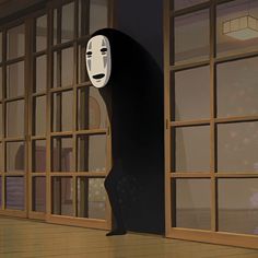 a person standing in front of a window with a mask on their face and behind them is an open door