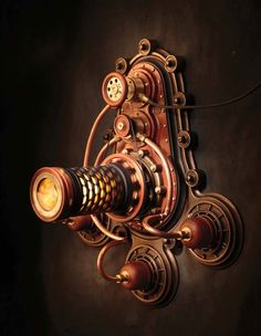 a steampunky lamp is hanging on the wall