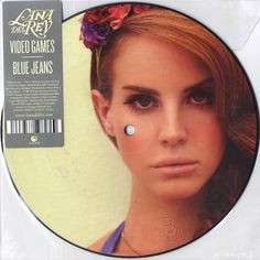 a cd cover with a woman's face and flowers on her head