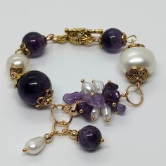 Amethyst and shell pearl bracelet is 18 cm length made with gold heart shaped lobster. Pink Pearl Bracelet, Shell Jewellery, Haldi Outfit, Memorial Bracelet, Cord Jewelry, Baroque Pearl Earrings, Shell Bracelet, Freshwater Pearls Earrings, Toggle Bracelet