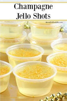 champagne jello shots in plastic cups with gold confetti on the side and text overlay that reads champagne jello shots