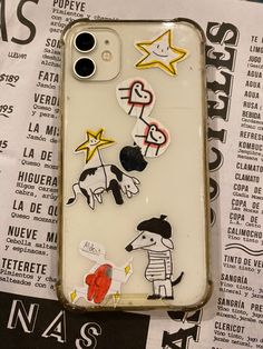 an iphone case with stickers on it