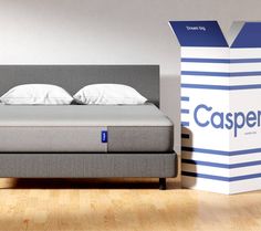 the casper mattress is in front of an empty box