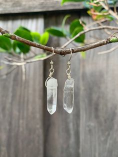 Clear Natural Quartz Dangle Earrings Powerful clear quartz earrings that will enhance your aura and promote self-growth! A perfect gift for yourself or the people in your life. Clear Quartz  Silver Plated Ear Wire  Comes with Silicone Backing Handmade Jewelry Care: - Keep away from moisture - Put on after applying hair products, sprays or lotions - Remove before sleep - Refrain from rigorous activities *Complimentary stickers included in every order Nickel Free Clear Drop Earrings, Nickel Free Clear Minimalist Earrings, Clear Minimalist Dangle Earrings, Sterling Silver Clear Earrings, Clear Dangle Earrings For Pierced Ears, Clear Dangle Crystal Earrings As A Gift, White Wire Wrapped Drop Earrings, Minimalist Clear Dangle Earrings, Nickel-free Clear Minimalist Earrings