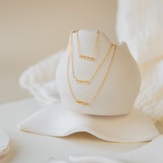 "D A I N T Y ∙ N A M E ∙ N E C K L A C E * Material: High Quality Solid 925 Sterling Silver * Finish: Sterling Silver ∙ 18K Gold ∙ Rose Gold * All our jewelry is custom made by hand with Love and Care in our workshop ♡ H O W ∙ T O ∙ O R D E R * Simply use the 'PERSONALIZATION BOX' upon ordering to let us know the NAME and FONT NUMBER that you would like. (Any font is available, not just our featured fonts) ♡ YOUR NAME + FONT NUMBER ♡ * The pictured necklace features Font 88. If a font is not giv Everyday Dainty Name Necklace For Mother's Day, Dainty Name Necklace For Birthday Gift, Minimalist Name Necklace For Mother's Day Birthday, Delicate Adjustable Necklace For Birthday, Dainty Name Necklace For Birthday, Minimalist Hypoallergenic Necklace For Birthday, Minimalist Hypoallergenic Necklaces For Birthdays, Minimalist Hypoallergenic Necklace For Birthdays, Numbers Font