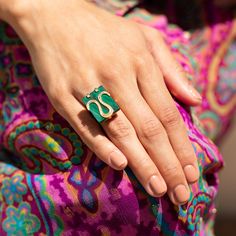 The Story A chic and unique ring made during the mid to late 20th century. Done in the Modernist style, a rectangular piece of malachite sits at center and measures approximately 22 mm x 17 mm. All handmade in rich 18 karat yellow gold, the Aries symbol is seen on top and helps set the stone in place. The setting and band are open and modern in feel. A super cool look, this ring is a perfect find for an Aries. It looks fantastic on its own or worn with other favorite rings. The Specs Style Numbe Aries Zodiac Symbol, Aries Symbol, Zodiac Rings, Zodiac Symbols, Aries Zodiac, 18k Gold Ring, Unique Ring, Late 20th Century, Favorite Rings