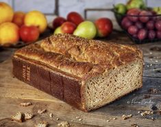 a loaf of bread sitting on top of a wooden table