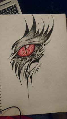 a drawing of a dragon eye with red eyes