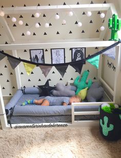 a child laying on top of a bed in a room