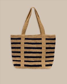 Introducing our Straw Traveler Tote - the perfect accessory to brighten up your spring and summer wardrobe! This versatile bag features a built-in spot to securely store your favorite sunhat while you're on-the-go. With its 100% Raffia Straw material and packable design, this bag is both stylish and functional. It's roomy enough to fit all of your beach day essentials measuring 20" x 14", with a convenient handle drop of 10". Style: 11418 Summer Travel Bag Made Of Jute, Lightweight Beachy Straw Travel Bag, Lightweight Beachy Straw Bag For Travel, Eco-friendly Beach Bag For Spring Travel, Spring Eco-friendly Beach Bag For Travel, Eco-friendly Spring Travel Beach Bag, Trendy Jute Beach Bag For Travel, Coastal Beach Bag For Everyday Summer Use, Lightweight Jute Travel Bags