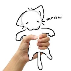 a hand holding up a drawing of a cat with the word wow written on it