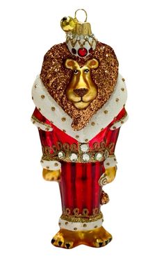 a glass ornament with a lion wearing a crown