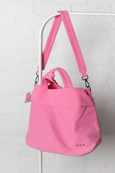 Carrie Catch All Shoulder Tote Bag - Fuchsia Sporty Shoulder Bag For Daily Use, Sporty Everyday Shoulder Bag With Double Handle, Sporty Shoulder Bag With Adjustable Strap For Everyday, Sporty Everyday Backpack, Pink Nylon Bag For Summer, Summer Pink Nylon Bags, Pink Nylon Gym Bag, Nylon Sports Bag With Softback, Sporty Shoulder Bag With Double Handle And Adjustable Strap