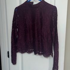 This Is In New Condition, With No Flaws. Tags Attached. It Is A Gorgeous Deep Plum Colored Lace. The Body Is Lined, The Sleeves Are Not. Has A Mock Neck With Zipper On Back. Can Provide Measurements. Size Says Medium, But It Fits Like An Extra Small Or Small. Please Request Measurements Bc You Cannot Return Due To It Not Fitting Winter Stretch Lace Top, Fitted Purple Lace Top, Purple Fitted Lace Top, Purple Floral Print Crew Neck Top, Purple Lace Tank Top, Purple V-neck Bohemian Blouse, Bohemian Purple V-neck Tops, Casual Purple Blouse 3/4 Sleeve, Deep Plum