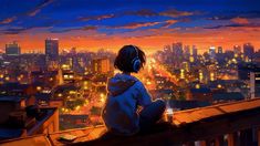 a person sitting on top of a roof with headphones in front of a cityscape