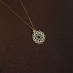 "Center your energy on something shiny and a reminder of happiness. Introducing the diamond chakra pendant that'll clean your negative energy. The stylish diamond stone will do the magic when you want to focus on yourself. F E A T U R E S * Made to Order. * Gold KT: 14K * Choice of Gold Color: Yellow Gold, Rose Gold, White Gold * Gem Stone: Genuine Diamond * Diamond-Cut: Round * Diamond Carat: 0.01 ct * Pendant Height: 18 mm / 0.70 inch * Pendant Width: 11 mm / 0.43 inch * Diamond Color-Clarity: Women Spiritual, Real Gold Necklace, Lotus Flower Necklace, Gold Jewelry Gift, Chakra Pendant, Real Gold Jewelry, Chakra Necklace, Solid Gold Necklace, Gold Diamond Necklace