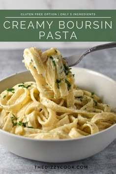 creamy bourssin pasta in a white bowl with a spoon