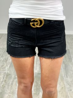 Women's Black Distressed Denim Shorts Under The Radar Shorts - Black Get ready to be the ultimate rockstar in these high-waisted shorts! With a destructed style and frayed hem, these shorts are perfect for any wild adventure. Complete with a classic 5-pocket design, zipper fly, and button closure. Don't pass up on these essential shorts! (Seriously.) Details Available in sizes S - L Several Color Options 95% Cotton, 4% Polyester, 1% Spandex Distressed Shorts With Pockets 95% Cotton, 4% Polyester Chic Distressed Jean Shorts, Chic Distressed Cutoff Shorts, Trendy Black Jean Shorts With Frayed Hem, Trendy Black Ripped Jean Shorts, Essential Shorts, Wild Adventures, Distressed Shorts, Distressed Denim Shorts, Shorts Black