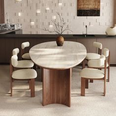 a dining table with six chairs around it