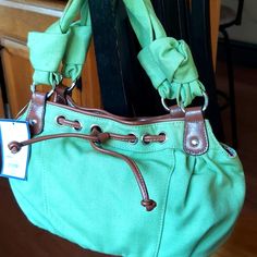 This Handbag Is Brand New With Tags.. Green Satchel With Handle Drop For Shopping, Green Bucket Shoulder Bag With Handle Drop, Green Satchel Bag With Handle Drop, Green Shoulder Bag With Handle Drop, Green Shoulder Bag With Handle Drop For Travel, Spring Bucket Shoulder Bag With Handle Drop, Casual Green Bag With Detachable Strap, Green Shopping Bags With Leather Handles, Green Bags With Leather Handles For Shopping